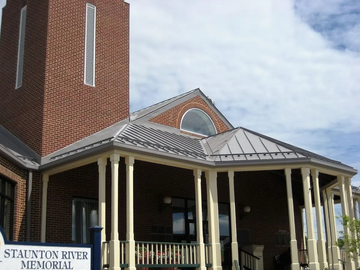 Skilled roofing craftsmen working on a residential roof in Dryville